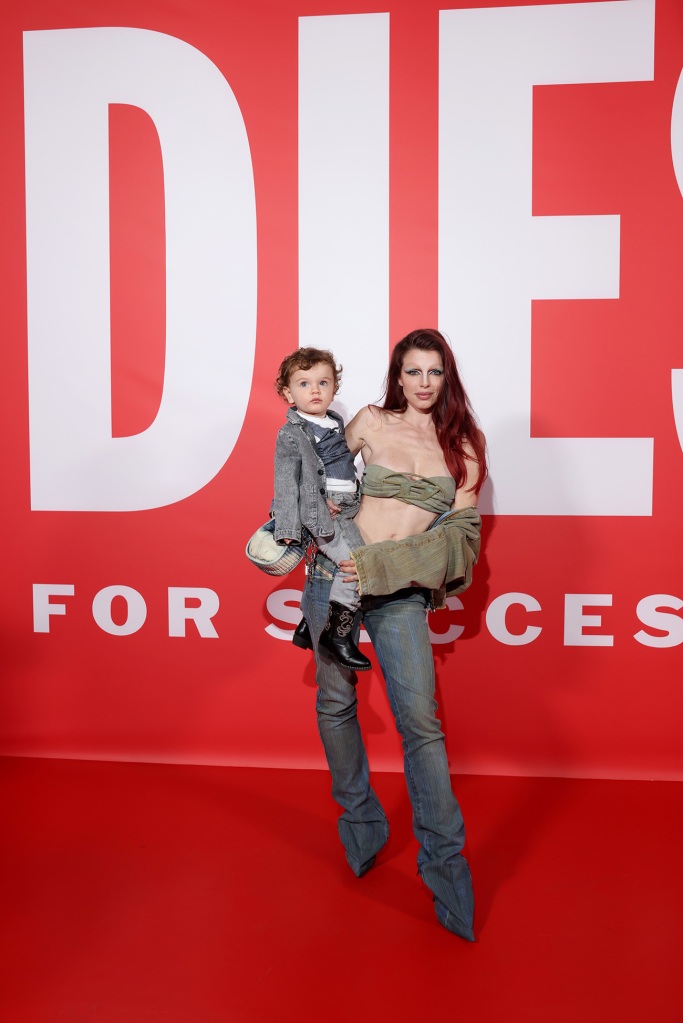 MILAN, ITALY - FEBRUARY 22: Julia Fox and Valentino Fox attend the Diesel Fashion Show during Milan Fashion Week Womenswear Fall/Winter 2023/24 on February 22, 2023 in Milan, Italy. (Photo by Victor Boyko/Getty Images for Diesel)